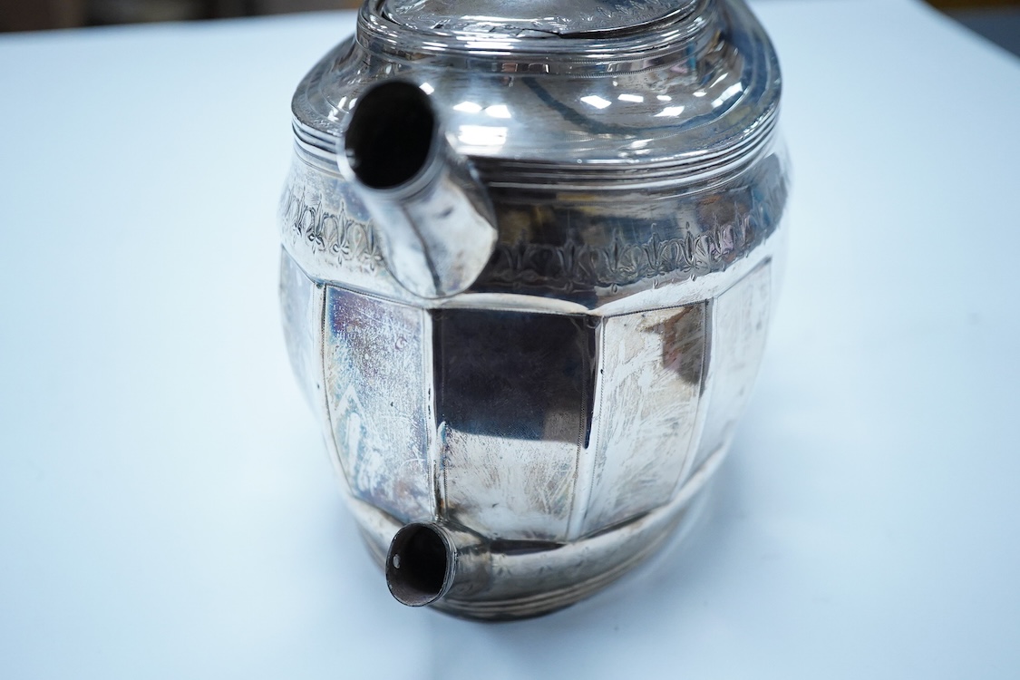 A George III silver oval teapot, by Peter, Ann & William Bateman, London 1804, (a.f.). engraved with floral bands, 14.4oz.